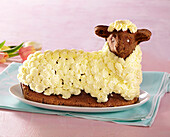 Easter chocolate lamb with cranberries and white cream