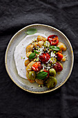 Labneh with butter beans, tomato confit, and grilled olives