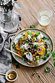 Couscous salad with baked beetroot, orange, burrata and avocado sauce
