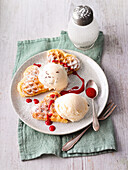 Two kinds of ice cream on fragrant vanilla wafers