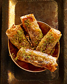 Filo rolls with apple, honey and pistachios
