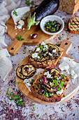 Toast with grilled eggplant and olives