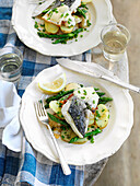 Sea bass with asparagus and Jersey Royals
