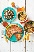 Szechuan chicken stew, lentil salad with chorizo, pizza with tomatoes and pesto