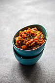 Vegetable stew in blue ceramic bowl