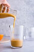 Healthy orange smoothie for breakfast