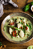 Homemade Thai green chicken curry in a bowl