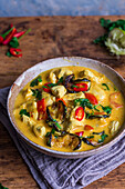 A bowl of Thai red chicken curry