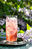 Pimm's cup with lilac blossoms