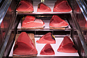 Pieces of tuna in a fridge