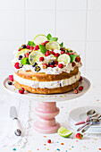 Lime and fresh berry cake with whipped cream filling