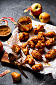 Apple fritters with toffee sauce