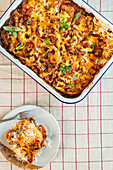 Vegetarian lasagne with butternut squash, tomatoes, and parmesan cheese