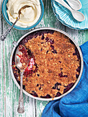 Crumble Pie with red currants and whipped cream