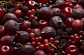 Autumnal fruit, figs, plums, blackberries, grapes