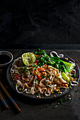 Vegan thai noodle salad with rice noodles, crunchy vegetables, beansprouts