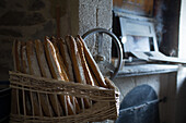 Freshly baked baguettes in a basket