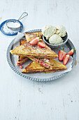 French toast with strawberries and vanilla ice cream