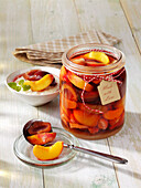 Rum stew with apricots, peaches, plums and strawberries