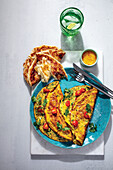 Spicy masala omelette with mango chili and paratha flatbread