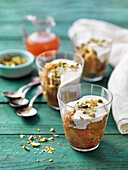 Rhubarb dessert with vanilla sauce and pistachios