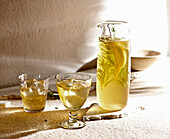 Limoncello with rosemary and ice cubes