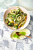 Spaghetti with a raw broccoli and apricot salad and coriander-and-lemon oil