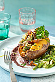 Stuffed sweet potato with mushrooms and lemon tapenade