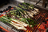 Catalan calcots grilled on charcoal