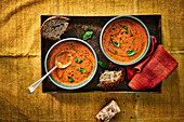 Creamy roasted tomato soup with bread