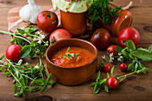 Homemade tomato passata with ingredients