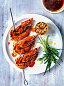 Grilled mediterranean prawns with chilli sauce and eroast lemon