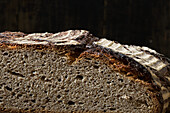 Close up of a slice of crusty bread