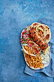 Chicken gyros with thyme-oregano fries