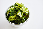 Steamed green vegetables in a bowl