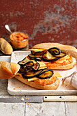 Aubergine and cheese baguette with red lentil cream