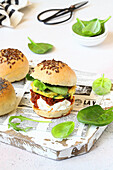 Burger buns with omelette goat cheese and tomato pate