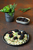 Risotto with cheese and blackberries