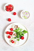 Rocket salad, raspberries spring onions and mozzarella