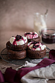 Chocolate ricotta donuts with elderberry compote