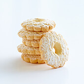 Flower-shaped vanilla biscuits on a white background