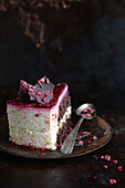 A slice of chocolate raspberry cream cake