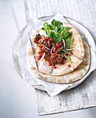 Lamb kebab on tortillas