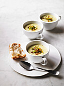 Leek and potato soup topped with fried leeks