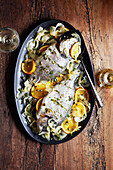 Roasted stuffed bream with fennel seeds and orange oil