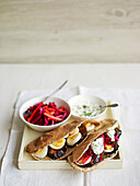 Vegetarian pittas with hard boiled eggs and beets