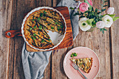 Quiche with green asparagus and spring onions