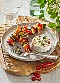 Grilled Camembert cheese with vegetable skewers
