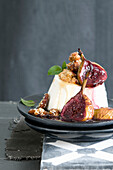 Red wine figs with panna cotta, nuts and sesame seeds