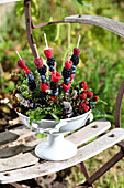 Decoratively arranged berry skewers